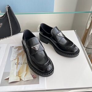 Prada Women's Black Glossy Loafers